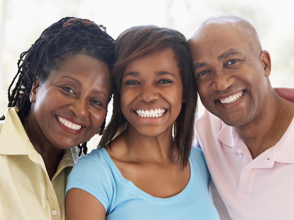 Couple With Their Teenage Daughter